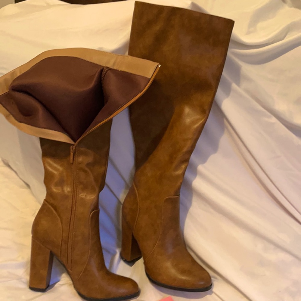 Boot with heel not leather. Size 7